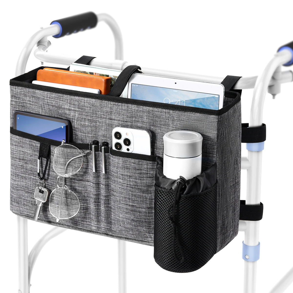 Walker caddy with multiple pockets holding a tablet, phone, glasses, keys, and an umbrella.